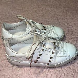 Valentino sneakers . Worn but have some life left!